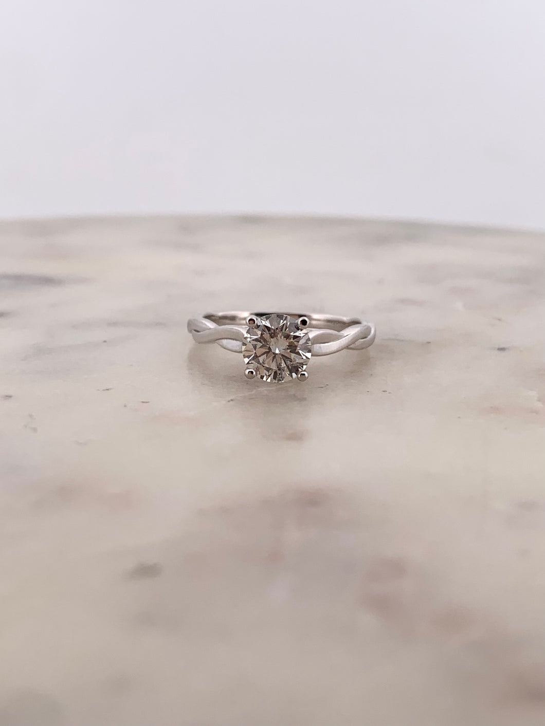 Round Swirl Solitaire Engagement Ring